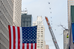Police helicopters conduct a flyover over 5th Avenue after the funeral service for NYPD Officer Wilbert Mora at St. Patrick’s Cathedral in New York, New York, on Feb. 2, 2022.  (Photo by Gabriele Holtermann/Sipa USA)
