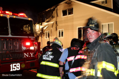 New York,  New York City Fire Department response  to a fire in the Gerritsen Beach neighborhood of Brooklyn when the arrived the quickly learned that a house was fully engulfed and it spread to an adjourning house. The fire Marshal's will determine the cause of the fire.