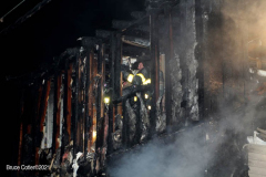 New York,  New York City Fire Department response  to a fire in the Gerritsen Beach neighborhood of Brooklyn when the arrived the quickly learned that a house was fully engulfed and it spread to an adjourning house. The fire Marshal's will determine the cause of the fire.