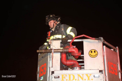 New York,  New York City Fire Department response  to a fire in the Gerritsen Beach neighborhood of Brooklyn when the arrived the quickly learned that a house was fully engulfed and it spread to an adjourning house. The fire Marshal's will determine the cause of the fire.