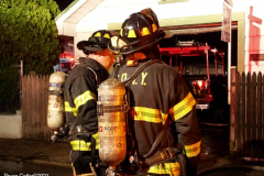 New York,  New York City Fire Department response  to a fire in the Gerritsen Beach neighborhood of Brooklyn when the arrived the quickly learned that a house was fully engulfed and it spread to an adjourning house. The fire Marshal's will determine the cause of the fire.