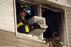 New York,  New York City Fire Department response  to a fire in the Gerritsen Beach neighborhood of Brooklyn when the arrived the quickly learned that a house was fully engulfed and it spread to an adjourning house. The fire Marshal's will determine the cause of the fire.