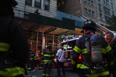 A fire broke out on the scaffolding of the iconic Cinema Village theater during the Wildlife Conservation Film Festival, on Saturday, October 16th in the West Village, NYC. 
The building which once housed a firehouse at the turn of the 20th century, had smoke bellowing from the top when a guest noticed.
FDNY found that possible cigarette butt thrown from above could be the possible culprit. Fortunately, no damage was done. (C) Bianca Otero, NYC, October 16, 2021.