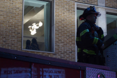 A fire broke out on the scaffolding of the iconic Cinema Village theater during the Wildlife Conservation Film Festival, on Saturday, October 16th in the West Village, NYC. 
The building which once housed a firehouse at the turn of the 20th century, had smoke bellowing from the top when a guest noticed.
FDNY found that possible cigarette butt thrown from above could be the possible culprit. Fortunately, no damage was done. (C) Bianca Otero, NYC, October 16, 2021.