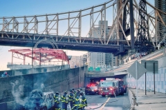 Firefighters Extinguish a car fire on the FDR drive at E. 63rd St. today. 
There were no injuries