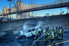 Firefighters Extinguish a car fire on the FDR drive at E. 63rd St. today. 
There were no injuries