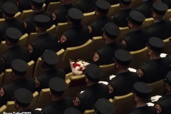 March 8, 2022  New York, 
Fire Department of The City of New York presents a Probationary Firefighter Graduation Ceremony at the Christian Cultural Center. 
.Flowers were placed where Probationary  firefighter Vincent Malveaux would have been seated. He died during a training exercise.