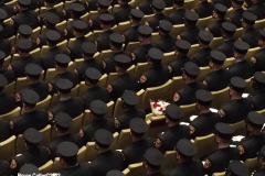 March 8, 2022  New York, 
Fire Department of The City of New York presents a Probationary Firefighter Graduation Ceremony at the Christian Cultural Center. 
.Flowers were placed where Probationary  firefighter Vincent Malveaux would have been seated. He died during a training exercise.