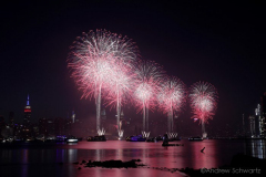 Fireworks light up the sky above the East River in New York City to celebrate Independence Day on July 4, 2021 in New York City. The fireworks were sponsored department store chain Macy's. (Photo by Andrew Schwartz)