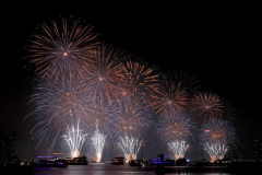 Fireworks light up the sky above the East River in New York City to celebrate Independence Day on July 4, 2021 in New York City. The fireworks were sponsored department store chain Macy's. (Photo by Andrew Schwartz)