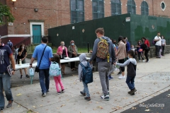 New York City starts the first day of school for Kindergarten students to eighth grade. On Thursday September 2, 2020 High School students will start classes.Teachers meet students outside of PS81x in the Riverdale section of the bronx they take the students temperature and then send them to meet other classmates and start the school day.