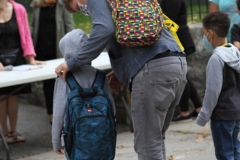 New York City starts the first day of school for Kindergarten students to eighth grade. On Thursday September 2, 2020 High School students will start classes.Teachers meet students outside of PS81x in the Riverdale section of the bronx they take the students temperature and then send them to meet other classmates and start the school day.