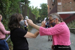 New York City starts the first day of school for Kindergarten students to eighth grade. On Thursday September 2, 2020 High School students will start classes.Teachers meet students outside of PS81x in the Riverdale section of the bronx they take the students temperature and then send them to meet other classmates and start the school day.Marissa Maher( gym teacher) & Nina Velasquez(parent Coordinator) check each other tempeture