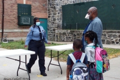 New York City starts the first day of school for Kindergarten students to eighth grade. On Thursday September 2, 2020 High School students will start classes.Teachers meet students outside of PS81x in the Riverdale section of the bronx they take the students temperature and then send them to meet other classmates and start the school day.