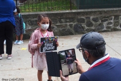 New York City starts the first day of school for Kindergarten students to eighth grade. On Thursday September 2, 2020 High School students will start classes.Teachers meet students outside of PS81x in the Riverdale section of the bronx they take the students temperature and then send them to meet other classmates and start the school day.