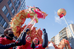 Dragon dancers perform in celebration of the Lunar New Year during the annual Flushing Lunar New Year Parade in Flushing NY on February 5, 2022. This year is celebrated as the year of the Tiger.  (Photo by Andrew Schwartz)