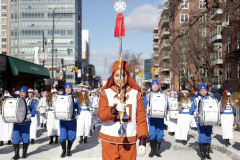 A marching band performs in celebration of the Lunar New Year during the annual Flushing Lunar New Year Parade in Flushing NY on February 5, 2022. This year is celebrated as the year of the Tiger. (Photo by Andrew Schwartz)