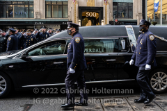 Thousands of police officers pay their respect as the hearse with the casket of fallen NYPD Officer Wilbert Mora makes its way down 5th Avenue in New York, New York, on Feb. 2, 2022. (Photo by Gabriele Holtermann/Sipa USA)