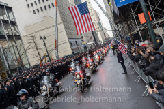 Motor units proceed the casket of NYPD Officer Wilbert Mora after his funeral service at St. Patrick’s Cathedral in New York, New York, on Feb. 2,  2022.  (Photo by Gabriele Holtermann/Sipa USA)