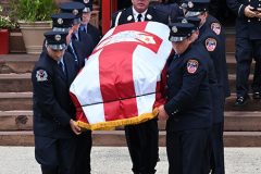 Monday, August 30, 2021
FDNY Line Of Duty Funeral
Staten Island, NY
Photographs by Mary DiBiase Blaich 

Firefighter Stephen J Reilly was remembered today with a Funeral Mass at Sacred Heart Church in Staten Island.  He died of cancer related to his 9/11 service. After the funeral Mass, family members were presented with FDNY items, including his helmet.
Attending were his company, Engine 155, Fire Commissioner Daniel Nigro, and many firefighters, family, and friends.  During the funeral, a call came in for a high angle rescue of a worker, and some of the mourners who were on duty left with lights and sirens.  One firefighter holds his handy talkie to listen to the “run”. While another looks down the street to view responding tower ladder #79.