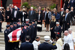 Monday, August 30, 2021
FDNY Line Of Duty Funeral
Staten Island, NY
Photographs by Mary DiBiase Blaich 

Firefighter Stephen J Reilly was remembered today with a Funeral Mass at Sacred Heart Church in Staten Island.  He died of cancer related to his 9/11 service. After the funeral Mass, family members were presented with FDNY items, including his helmet.
Attending were his company, Engine 155, Fire Commissioner Daniel Nigro, and many firefighters, family, and friends.  During the funeral, a call came in for a high angle rescue of a worker, and some of the mourners who were on duty left with lights and sirens.  One firefighter holds his handy talkie to listen to the “run”. While another looks down the street to view responding tower ladder #79.