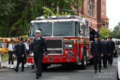 Monday, August 30, 2021
FDNY Line Of Duty Funeral
Staten Island, NY
Photographs by Mary DiBiase Blaich 

Firefighter Stephen J Reilly was remembered today with a Funeral Mass at Sacred Heart Church in Staten Island.  He died of cancer related to his 9/11 service. After the funeral Mass, family members were presented with FDNY items, including his helmet.
Attending were his company, Engine 155, Fire Commissioner Daniel Nigro, and many firefighters, family, and friends.  During the funeral, a call came in for a high angle rescue of a worker, and some of the mourners who were on duty left with lights and sirens.  One firefighter holds his handy talkie to listen to the “run”. While another looks down the street to view responding tower ladder #79.
