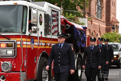 Monday, August 30, 2021
FDNY Line Of Duty Funeral
Staten Island, NY
Photographs by Mary DiBiase Blaich 

Firefighter Stephen J Reilly was remembered today with a Funeral Mass at Sacred Heart Church in Staten Island.  He died of cancer related to his 9/11 service. After the funeral Mass, family members were presented with FDNY items, including his helmet.
Attending were his company, Engine 155, Fire Commissioner Daniel Nigro, and many firefighters, family, and friends.  During the funeral, a call came in for a high angle rescue of a worker, and some of the mourners who were on duty left with lights and sirens.  One firefighter holds his handy talkie to listen to the “run”. While another looks down the street to view responding tower ladder #79.