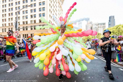 A man with a ballon costume at the New York City Pride March.