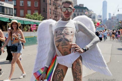 Dressed in all manner of costumes and color, parade-goers participate in the annual New York City Pride March on Sunday, June 26, 2022 in New York City. The annual celebration of LGBTQ pride returned to full capacity this year after being cancelled in 2020 and scaled back in 2021 due to the COVID-19 pandemic. (Photo by Andrew Schwartz)