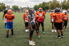 The summer heat didn't stop players to give it their all at the inaugural flag football tournament in memory of Det. Keith Williams. (Photo by Gabriele Holtermann)