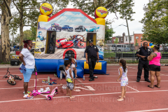 The summer heat didn't stop players to give it their all at the inaugural flag football tournament in memory of Det. Keith Williams. (Photo by Gabriele Holtermann)