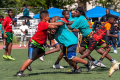 The summer heat didn't stop players to give it their all at the inaugural flag football tournament in memory of Det. Keith Williams. (Photo by Gabriele Holtermann)