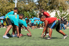 The summer heat didn't stop players to give it their all at the inaugural flag football tournament in honor of Det. Keith Williams. (Photo by Gabriele Holtermann)