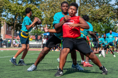 The summer heat didn't stop players to give it their all at the inaugural flag football tournament in memory of Det. Keith Williams. (Photo by Gabriele Holtermann)