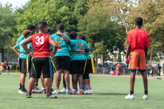 The summer heat didn't stop players to give it their all at the inaugural flag football tournament in memory of Det. Keith Williams. (Photo by Gabriele Holtermann)