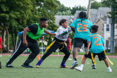 The summer heat didn't stop players to give it their all at the inaugural flag football tournament in memory of Det. Keith Williams. (Photo by Gabriele Holtermann)