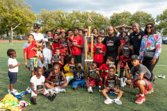The winning team, the Playmakers, present their throphy. (Photo by Gabriele Holtermann)