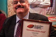 Guardian Angels from all over 5 Boroughs schlepped through the snow and met in Washington Heights at the Angelica’s Uptown Cafe on W 187th Street to celebrate the 43rd Anniversary of the beloved and renowned establishment begun by Curtis Sliwa in the Bronx with just 13 kids in 1979. 
Several hundred came to show their respects and to celebrate where Officials and Heads of the Districts and Chapters spoke and gave out awards to the outstanding representatives and Guardians of 2021.
“We are no different from one another. Guardian Angels have given people a purpose, a duty of providing safety and security amongst their communities,” was exclaimed. 
“Crime has gone up and recruitment is harder,” were other sentiments shared on not only local but Global as well. The Guardian Angels spans now 13 countries across the Globe with Japan holding 21 chapters alone. International presence was provided via ZOOM during the event.
Many people who have been involved in Guardian Angels have moved onto other areas of security jobs and the security sectors.
Sliwa encouraged the importance of keeping streets safe especially in times of uncertainty and the power of community and most of all harmony amongst all.
Manhattan, NYC. February 13, 2022. (C) Bianca Otero