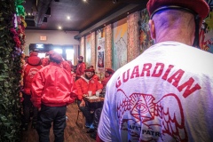 Guardian Angels from all over 5 Boroughs schlepped through the snow and met in Washington Heights at the Angelica’s Uptown Cafe on W 187th Street to celebrate the 43rd Anniversary of the beloved and renowned establishment begun by Curtis Sliwa in the Bronx with just 13 kids in 1979. 
Several hundred came to show their respects and to celebrate where Officials and Heads of the Districts and Chapters spoke and gave out awards to the outstanding representatives and Guardians of 2021.
“We are no different from one another. Guardian Angels have given people a purpose, a duty of providing safety and security amongst their communities,” was exclaimed. 
“Crime has gone up and recruitment is harder,” were other sentiments shared on not only local but Global as well. The Guardian Angels spans now 13 countries across the Globe with Japan holding 21 chapters alone. International presence was provided via ZOOM during the event.
Many people who have been involved in Guardian Angels have moved onto other areas of security jobs and the security sectors.
Sliwa encouraged the importance of keeping streets safe especially in times of uncertainty and the power of community and most of all harmony amongst all.
Manhattan, NYC. February 13, 2022. (C) Bianca Otero