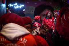 Guardian Angels from all over 5 Boroughs schlepped through the snow and met in Washington Heights at the Angelica’s Uptown Cafe on W 187th Street to celebrate the 43rd Anniversary of the beloved and renowned establishment begun by Curtis Sliwa in the Bronx with just 13 kids in 1979. 
Several hundred came to show their respects and to celebrate where Officials and Heads of the Districts and Chapters spoke and gave out awards to the outstanding representatives and Guardians of 2021.
“We are no different from one another. Guardian Angels have given people a purpose, a duty of providing safety and security amongst their communities,” was exclaimed. 
“Crime has gone up and recruitment is harder,” were other sentiments shared on not only local but Global as well. The Guardian Angels spans now 13 countries across the Globe with Japan holding 21 chapters alone. International presence was provided via ZOOM during the event.
Many people who have been involved in Guardian Angels have moved onto other areas of security jobs and the security sectors.
Sliwa encouraged the importance of keeping streets safe especially in times of uncertainty and the power of community and most of all harmony amongst all.
Manhattan, NYC. February 13, 2022. (C) Bianca Otero
