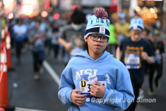 March 20, 2022: The 2022 United Airlines NYC Half Marathon is held in New York City. The course starts in Prospect Park in Brooklyn and ends in Central Park in Manhattan. The Rising New York Road Runner races in Times Square. (Photos by Jon Simon)