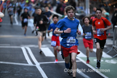 March 20, 2022: The 2022 United Airlines NYC Half Marathon is held in New York City. The course starts in Prospect Park in Brooklyn and ends in Central Park in Manhattan. The Rising New York Road Runner races in Times Square. (Photos by Jon Simon)