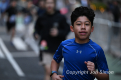 March 20, 2022: The 2022 United Airlines NYC Half Marathon is held in New York City. The course starts in Prospect Park in Brooklyn and ends in Central Park in Manhattan. The Rising New York Road Runner races in Times Square. (Photos by Jon Simon)