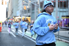 March 20, 2022: The 2022 United Airlines NYC Half Marathon is held in New York City. The course starts in Prospect Park in Brooklyn and ends in Central Park in Manhattan. The Rising New York Road Runner races in Times Square. (Photos by Jon Simon)