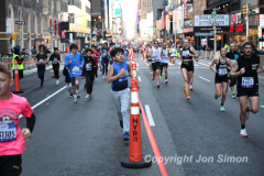 March 20, 2022: The 2022 United Airlines NYC Half Marathon is held in New York City. The course starts in Prospect Park in Brooklyn and ends in Central Park in Manhattan. The Rising New York Road Runner races in Times Square. (Photos by Jon Simon)