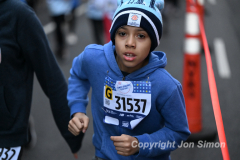 March 20, 2022: The 2022 United Airlines NYC Half Marathon is held in New York City. The course starts in Prospect Park in Brooklyn and ends in Central Park in Manhattan. The Rising New York Road Runner races in Times Square. (Photos by Jon Simon)