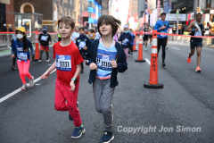 March 20, 2022: The 2022 United Airlines NYC Half Marathon is held in New York City. The course starts in Prospect Park in Brooklyn and ends in Central Park in Manhattan. The Rising New York Road Runner races in Times Square. (Photos by Jon Simon)