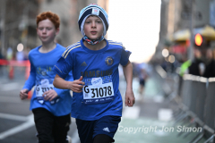 March 20, 2022: The 2022 United Airlines NYC Half Marathon is held in New York City. The course starts in Prospect Park in Brooklyn and ends in Central Park in Manhattan. The Rising New York Road Runner races in Times Square. (Photos by Jon Simon)