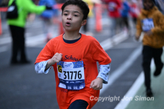 March 20, 2022: The 2022 United Airlines NYC Half Marathon is held in New York City. The course starts in Prospect Park in Brooklyn and ends in Central Park in Manhattan. The Rising New York Road Runner races in Times Square. (Photos by Jon Simon)