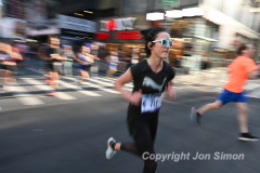March 20, 2022: The 2022 United Airlines NYC Half Marathon is held in New York City. The course starts in Prospect Park in Brooklyn and ends in Central Park in Manhattan. The Rising New York Road Runner races in Times Square. (Photos by Jon Simon)